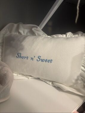 Short n' Sweet White Decorative Throw Pillow with Blue Embroidery